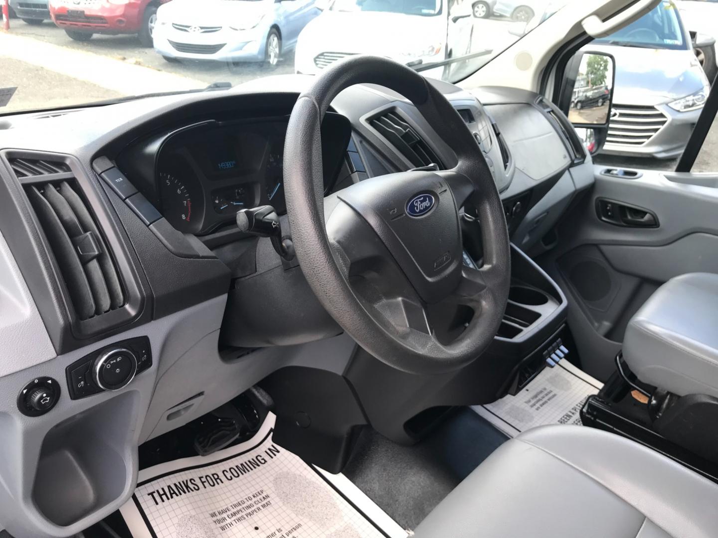 2018 White /Gray Ford Transit 150 Low Roof (1FTYE1YM7JK) with an 3.7 V6 engine, Automatic transmission, located at 577 Chester Pike, Prospect Park, PA, 19076, (610) 237-1015, 39.886154, -75.302338 - 2018 Ford Transit 150 Low Roof: Double drop down ladder racks, multiple pieces of shelving, heavy duty partition, new PA inspection, FLEET MAINTAINED, runs LIKE NEW! This vehicle comes inspected and has been given a bumper to bumper safety check. It is very clean, reliable, and well maintained. W - Photo#13